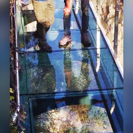 The cracks were reportedly caused by tourists who had dropped a thermos flask on the reinforced glass flooring. Photo: SCMP Picutres