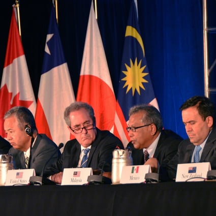 Trade ministers of the United States and 11 other Pacific Rim countries attend a press conference after negotiating the Trans-Pacific Partnership trade agreement in Atlanta. Photo: Xinhua