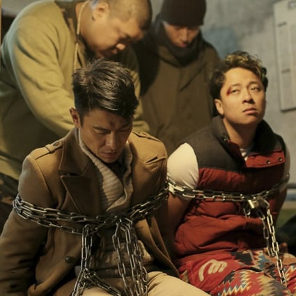 Andy Lau (left) and Cai Lu as the abductees in Saving Mr Wu.