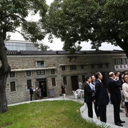 Guests attend the opening ceremony of the Stone Houses Family Garden in Kowloon City yesterday.Photos: Jonathan Wong