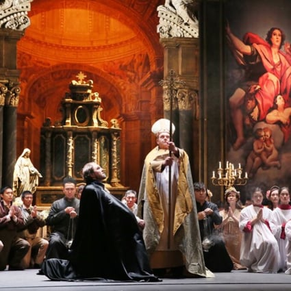 The grand church scene from Tosca with Scarpia the police chief (baritone Davide Damiani), clerics and choirboys. Photos: Opera Hong Kong