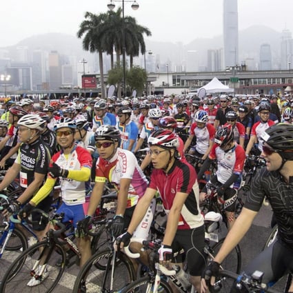 Riders line up at the start of the Cyclothon 35km race in Tsim Sha Tsui on Sunday. Photo: Reuters