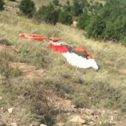 The pilot's parachute at the crash site. Photo: CCTV