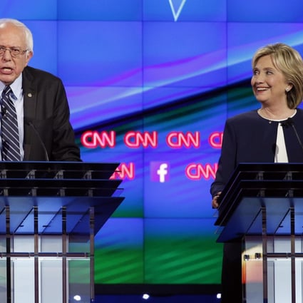 Bernie Sanders makes a point in the first Democratic debate of the campaign as a smiling Hillary Clinton looks on. The former secretary of state was tough, nimble and largely unruffled.Photo: AP