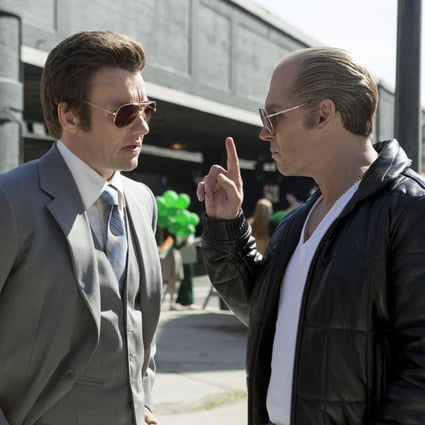 Joel Edgerton (left) and Johnny Depp in a scene from Black Mass, the film about Boston gangster James 'Whitey' Bulger. Photo: AP