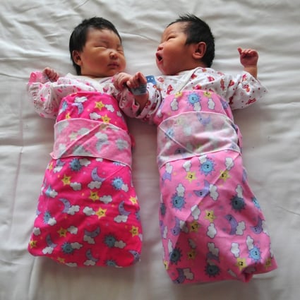 Double happiness: The shackles have been lifted from Chinese couples' reproductive wishes. Photo: AFP