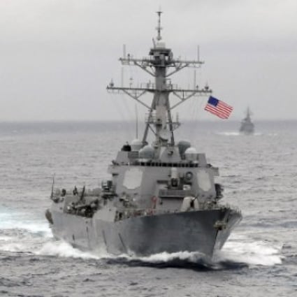 The destroyer USS Lassen patrolled inside the 12-nautical-mile (22km) limit around two Chinese-built reefs in the South China Sea on Tuesday. Photo: Reuters