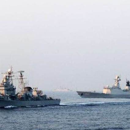 Two Chinese navy vessels taking part in a "realistic confrontation exercise" in the South China Sea. State media said late on Thursday that the drills had taken place in the nation's territorial waters. Photo: SCMP Pictures