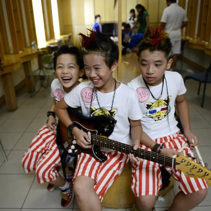 Giving children ownership of their music tastes will increase their interest. Photo: AFP