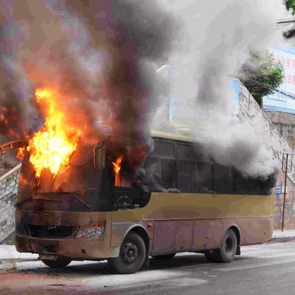 The bus ablaze in Chongqing. Photo: China News Service