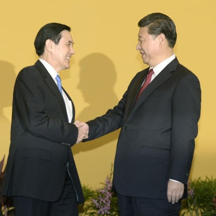 Chinese President Xi Jinping (right) shakes hands with his Taiwan counterpart Ma Ying-jeou before the start of the first cross-Taiwan Strait summit since a civil war divided the two sides in 1949. Photo: Kyodo