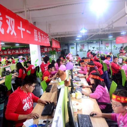 Employees at snacks retailer Three Squirrels communicate with shoppers online during China's Singles Day. Photos: Xinhua