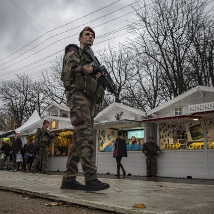 Soldiers keep watch at Paris' Champs-Elysees. Photo: EPA