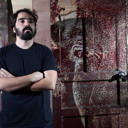 Alexandre Farto, also known as Vhils, in Aberdeen. Photo: Felix Wong