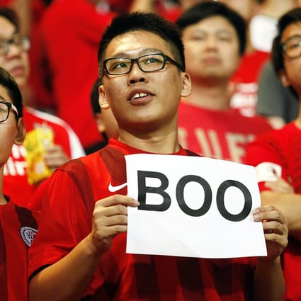 A Hong Kong fan 'voices' his displeasure ahead of the Hong Kong-China World Cup qualifier last week. Photo: AFP