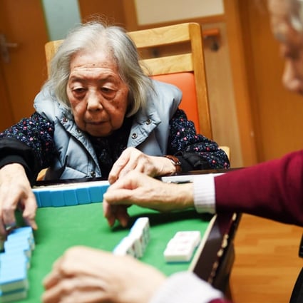 Elderly women playing mahjong at a nursing home in Beijing. Some 15.5 per cent of the population was aged above 60 last year. Photo: AFP