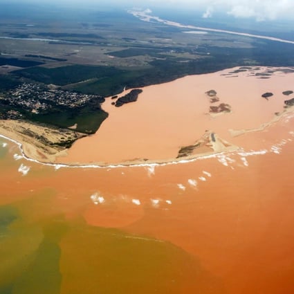 The toxic dam spill has spread along the Rio Dolce.Photo: AFP