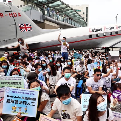 Hundreds of the airline’s flight attendants protesting in May before the latest pay deal was struck. Photo: K.Y. Cheng