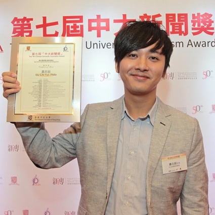 Phila Siu displays his certificate of merit. Photo: SCMP Pictures