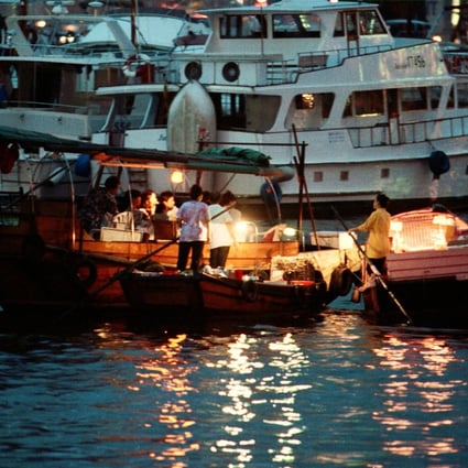 Floating seafood restaurants at the Causeway Bay Typhoon Shelter.