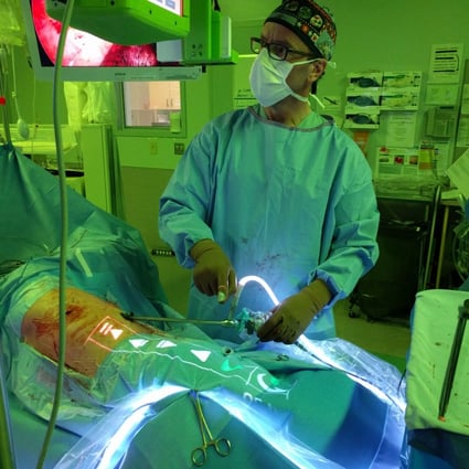 Surgeon James Bond uses NZ Technologies’ Tipso interface during an operation at Surrey Memorial Hospital. Photo: Submitted
