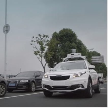 Didi Chuxing tests a self-driving vehicle (right) on a Chinese road. (Source: Didi Chuxing)