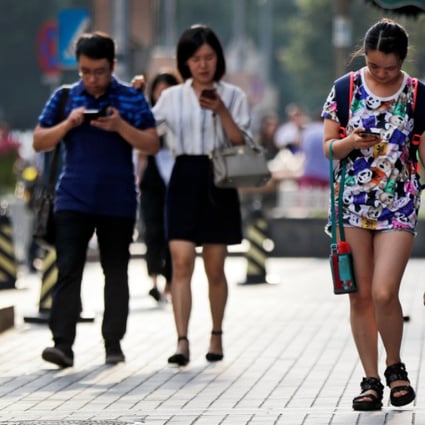 According to China’s Broadband Development Alliance, more than 85% of the population use mobile broadband. (Picture: AP Photo)
