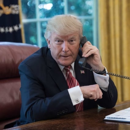 President Trump using the White House landline in June, 2017. (Picture: AFP Photo)
