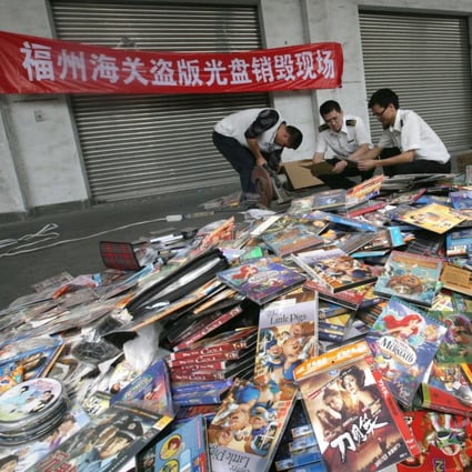 Every year, China has to destroy a ton of pirated DVDs. (Picture: Weibo/Fuzhou Customs)