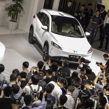 Xpeng co-founder He Xiaopeng speaking at the Guangzhou International Automobile Exhibition in November 2018. (Picture: Bloomberg)