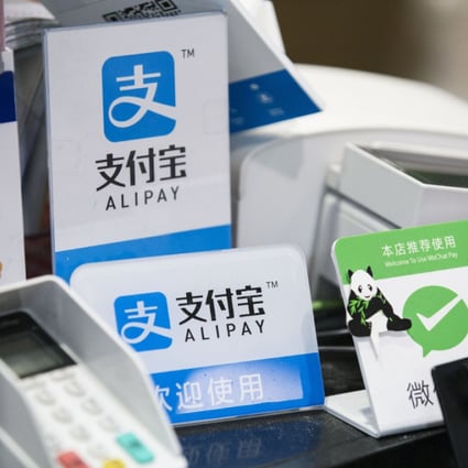 Virtually all mobile payments in China go through either Alipay or WeChat Pay. India's Unified Payments Interface offers a more competitive landscape with 87 mobile payment apps to choose from. (Picture: Shiho Fukada/Bloomberg)