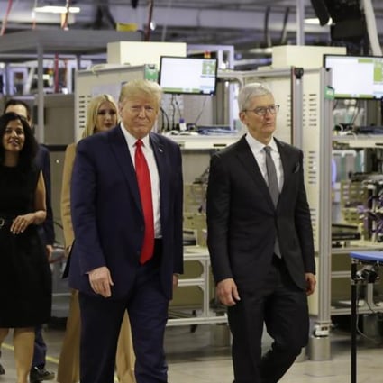 President Donald Trump tours an Apple manufacturing plant in Austin, Texas with Apple CEO Tim Cook on Wednesday. (Picture: Evan Vucci/AP Photo)