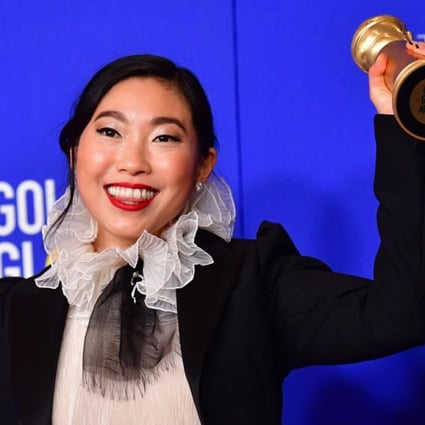 Awkwafina poses backstage with her Best Performance by an Actress in a Motion Picture - Musical or Comedy award for The Farewell. (Picture: Frederic J. Brown/AFP)