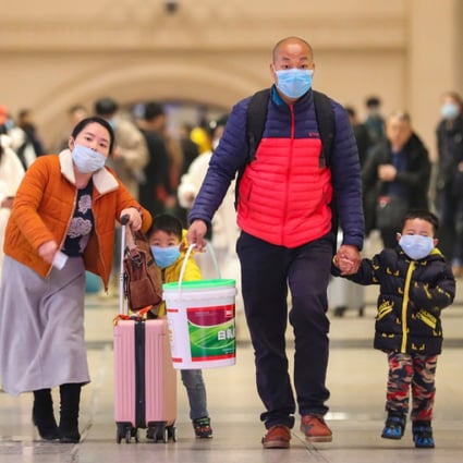 Travelers wearing face masks at Hankou Railway Station in Wuhan in southern China's Hubei province on January 21. (Picture: AP)
