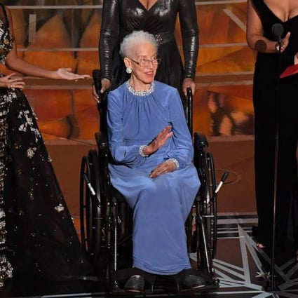 Katherine Johnson surrounded by actresses Janelle Monae, Taraji P. Henson and Octavia Spencer on stage at the 89th Oscars in 2017. (Picture: Mark Ralston/AFP Photo)