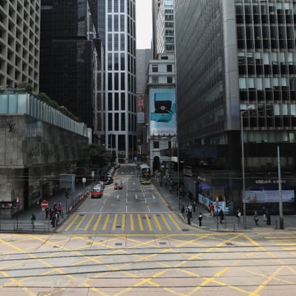 Even in Hong Kong’s central business district, few people are seen on the streets as lunch hour approaches because of the coronavirus epidemic. (Picture: SCMP)