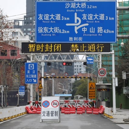 A blocked road in Wuhan on February 7 amid the coronavirus outbreak. (Picture: Reuters)