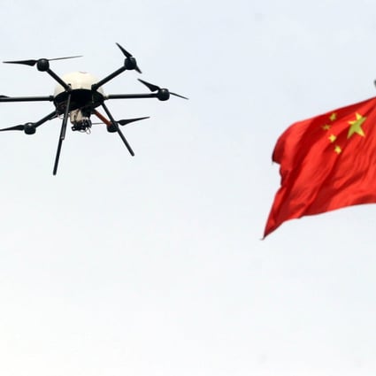 An unmanned aircraft being tested during a campaign for disaster prevention and reduction in Beijing in May 2015. (Picture: AFP)