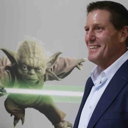 Kevin Mayer, then-chief strategy officer at Disney, visits the company’s “accelerator” space in Glendale, California on July 13, 2015. Photo: AP Photo