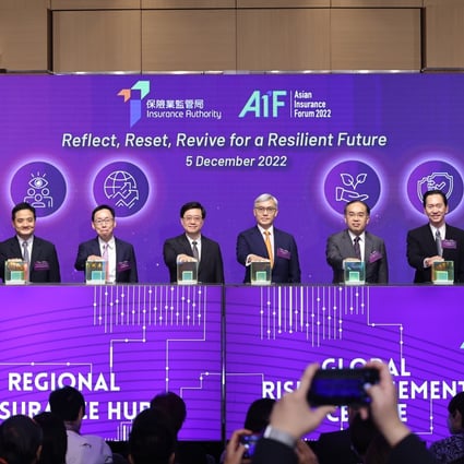 Officiating guests at the opening ceremony of the AIF 2022 (from left): Kwok Kwok-chuen, Chief Executive Officer, Hong Kong Academy of Finance; Dr Stephen Wong, Member of Legislative Council (Election Committee) of the HKSAR; Chan Kin-por, Non-Official Member of Executive Council of the HKSAR; John Lee, Chief Executive of the HKSAR; Stephen Yiu, Chairman of the IA; Christopher Hui, Secretary for Financial Services and the Treasury of the HKSAR; Bernard Charnwut Chan, Hong Kong Deputy to the National People’s Congress of the People’s Republic of China; and Clement Cheung, Chief Executive Officer of the IA.
