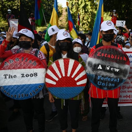 Representatives from the Karen ethnic group take part in a demonstration against the military coup, in Yangon, on February 11. Photo: AFP