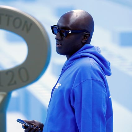 FILE PHOTO: Designer Virgil Abloh is seen before his Fall/Winter 2020 collection show for fashion house Louis Vuitton during Men’s Fashion Week in Paris, France, January 16, 2020. REUTERS/Charles Platiau/File Photo