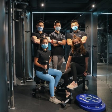 James Wong (middle at the back), Keith Lee (left at the back) with trainers Richard Lau (right); Iman Yung (front, left) and Cherry Yeung at Two Percent Fitness. Photo: KY Cheng