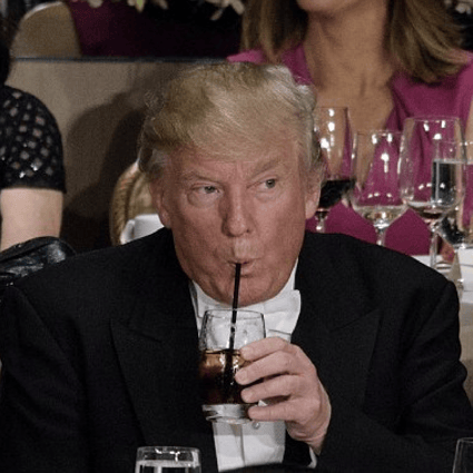 Donald Trump sucks on a Diet Coke at the Al Smith Memorial Foundation Dinner in New York in 2016. Photo: AFP via Getty