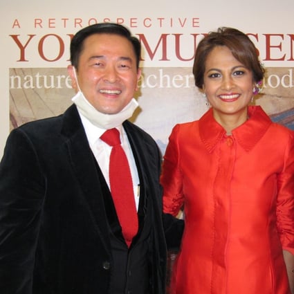 Michael Yong-Haron (left) and his wife Saniza Othman at the opening of the Yong Mun Sen exhibition in Wan Chai, Hong Kong. Photo: Michael and Saniza Collection