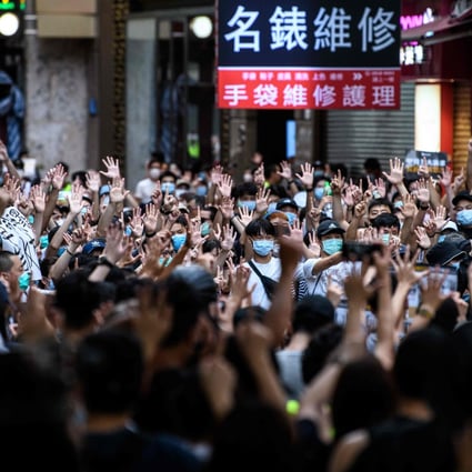 Protesters chant slogans and gesture during a rally against a new national security law in Hong Kong on July 1, 2020, on the 23rd anniversary of the city’s handover from Britain to China. Photo: AFP