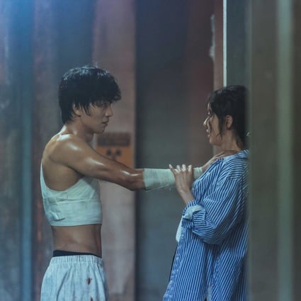 Kim Rae-won (left) and Lee Da-hee in a still from L. U. C. A.: The Beginning.