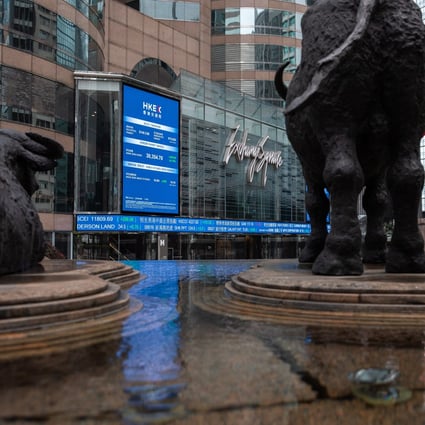 An electronic board displays stock figures outside Exchange Square in Hong Kong on February 25. Get ready to see the back of the bull for a good long while. Photo: EPA-EFE