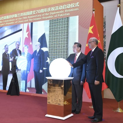 Foreign Minister Wang Yi (second right) attends a virtual ceremony with Pakistani Foreign Minister Shah Mahmood Qureshi to formally commence the celebrations of the 70th anniversary of diplomatic relations between the two countries in Beijing on March 2. Photo: Xinhua