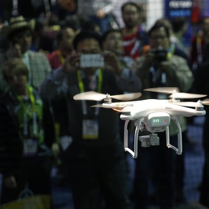 A drone hovers at the DJI booth during CES International in Las Vegas, Nevada, US. Photo: AP Photo
